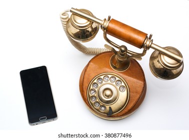 Old Vintage Phone And New Modern Smartphone