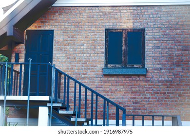 Old And Vintage Red Brick Wall With Windows Fram.
