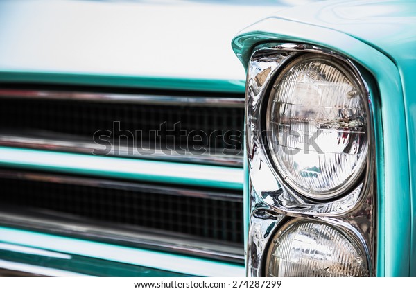 Old\
vintage or retro car auto front lights or\
headlights