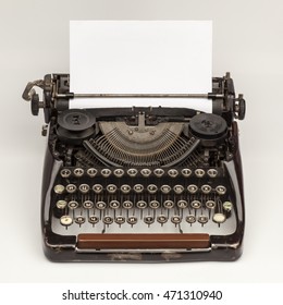 Old vintage russian typewriter and a blank sheet of paper inserted