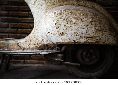 Old , vintage rusty of motorcycle with brick wall background - Shutterstock ID 1038098038
