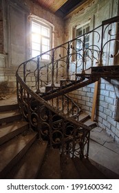 Old vintage spiral staircase at the old abandoned building