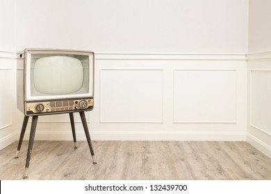 Old Vintage Television In The Corner Of Cozy Room, Left Hand Space Available For Text Or Graphic