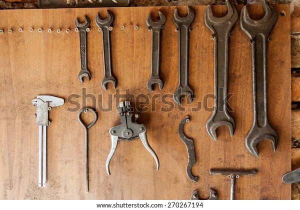 Old Vintage Tools Hanging On Wooden Stock Photo Edit Now 270267194