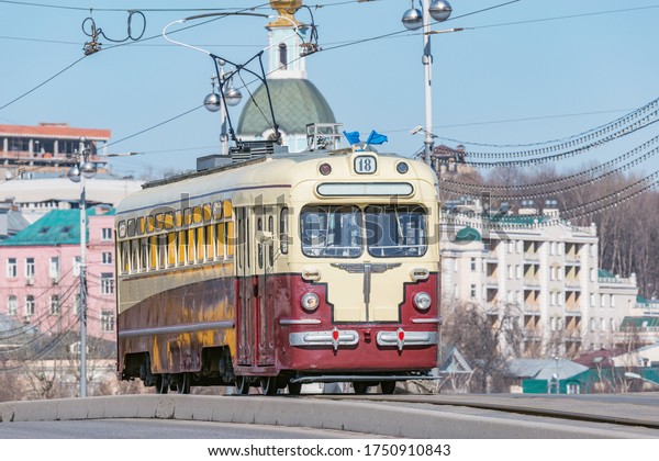 Old vintage tramway cars on the empty city
street. Moscow. Russia.