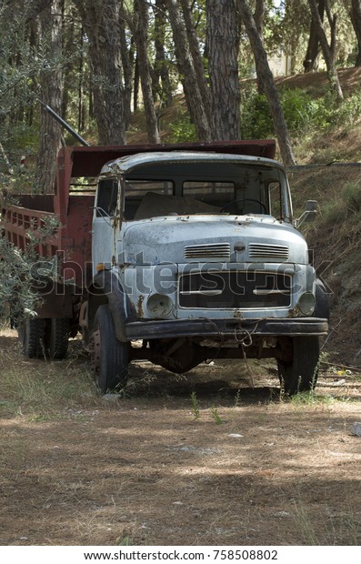 Old vintage truck in the wood on the island\
Rhodes (Greece)