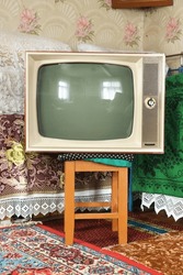 Old Vintage TV In A Rustic Interior.