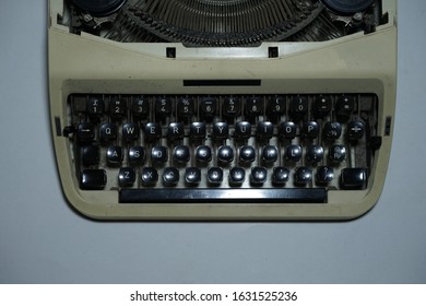 Old Vintage Typewriter Machine Closeup Photo. Antique Typewriter. isolated on white