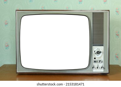 Old vintage white screen TV in a room with vintage wallpaper. Interior in the style of the 1960s. - Shutterstock ID 2153181471