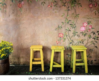 Old Vintage Wooden Chair And Wall