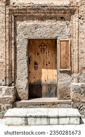 Old vintage wooden church door -entrance to the Christian church