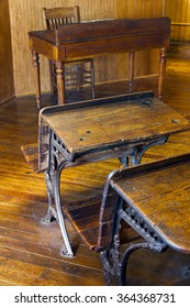 Old Vintage Wooden School Desks in Classroom
