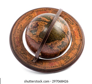 Old vintage wooden terrestrial world globe showing the maps of the continents and oceans for travel, geography and navigation lying at an oblique angle over white