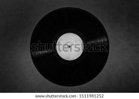 Old vinyl record on a black background