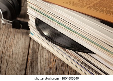 Old vinyl records in a stack.