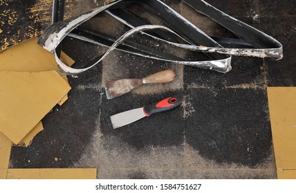 Old Vinyl Tiles And Batten Removing From Kitchen Floor, Spatula Trowel