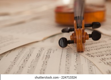 Old Violin Lying On The Sheet Of Music, Music Concept