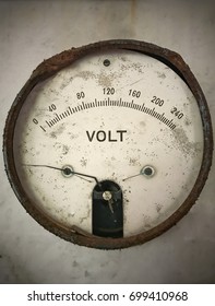 Old voltage meter. Zero to two hundred forty. Metering system broken.