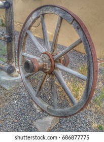 Old Wagon Wheel In Small Western Town In Utah.