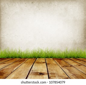 Old Wall And Green Grass On Wood Floor Background