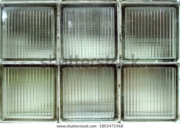 Old wall made of glass blocks. Glass blocks background. \
      
