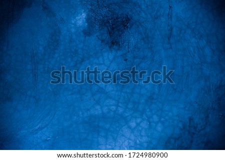 Old wall pattern texture cement blue dark abstract  blue color design are light with black gradient background.