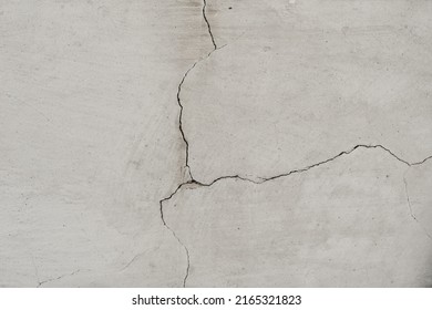 Old wall with white plaster and cracked peeling texture in black and white copy space. Grunge cracked concrete wall. Grungy wide brickwall. - Shutterstock ID 2165321823