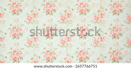 Old wallpaper on the wall. Old wallpaper for texture or background.