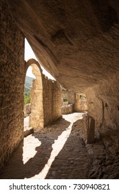 Old walls built close to the rock at Santo Spirito at Maiella