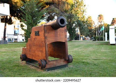 Old War Cannon From A Ship Now Resting In A Garden