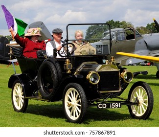 Old Warden Airfield, Bedfordshire, UK - 08/06/17: 1912 Ford Model T Tourer, Flying Suffragette Flag, At The 2017 Edwardian Pagent Held By The Shuttleworth Collection.