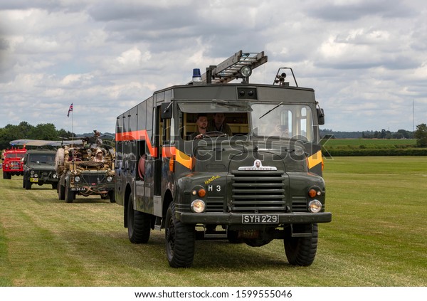 OLD\
WARDEN, BEDFORDSHIRE, UK – JULY 7, 2019: Bedford RLHZ Self\
Propelled Pump Green Goddess, Reg SYH 229, seen in the vehicle\
parade prior to the Military Airshow at Old\
Warden.
