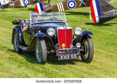 OLD WARDEN, BEDFORDSHIRE, UK – MAY 6, 2018: 1939 MG TA Midget KHX 55 Two-seater Sports Car takes part in the Vehicle Parade at Old Warden prior to the start of the 100th Anniversary of the RAF Airshow