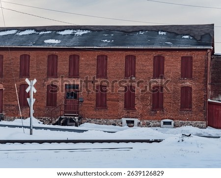 Old Warehouse along the Railroad Tracks on a Snowy Day in Pennsylvania