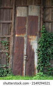 An Old Warehouse Door Made Of Zinc 