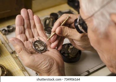 old watchmaker at work - Powered by Shutterstock