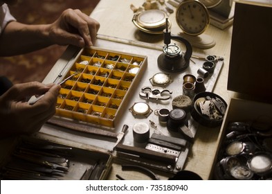 old watchmaker at work