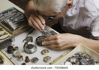 old watchmaker at work - Powered by Shutterstock