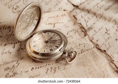 old watch,old-time documents,past and future