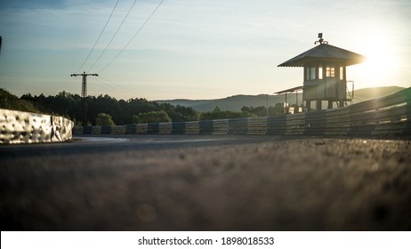 An Old Watchtower On A Out Of Order Rallycross Track, Pictured In Sunrise.