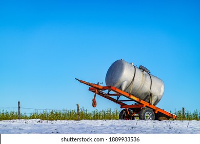 Old Water Container Trailer At A Field