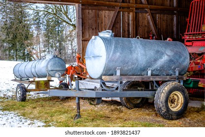 Old Water Container Trailer At A Field