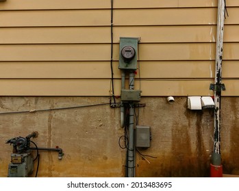 Old Water Meter In Old House. Retro House Wall