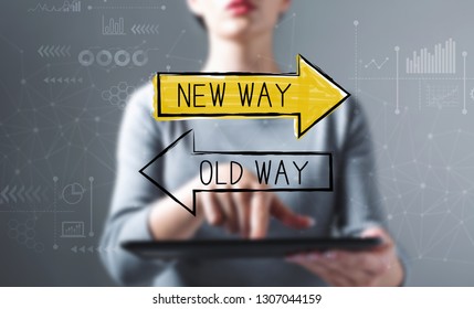 Old Way Or New Way With Business Woman Using A Tablet Computer