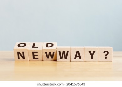 Old way or new way concept. Wooden block flip word on table with word old way and new way