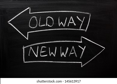 Old Way, New Way written on a blackboard with arrows pointing in the direction of the past and the future. A concept for adapting to change, improvement and development for the self or the business - Shutterstock ID 145613917