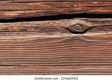 Old Weathered Dark Brown Cracked Wood Beam Surface With Nice Rough Grain Texture.