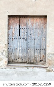 Old Weathered Door In A Little Town