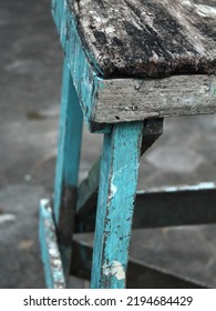 An Old, Weathered Emerald Colored Vintage Wood Chair.