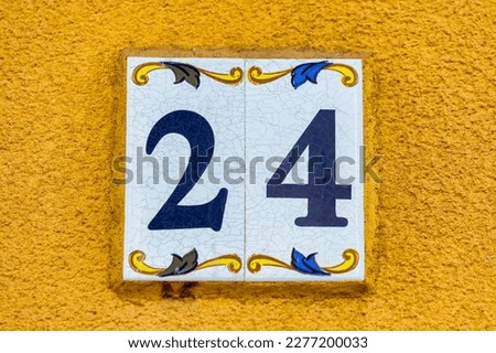 Old Weathered House Number 24, Tile on Wall